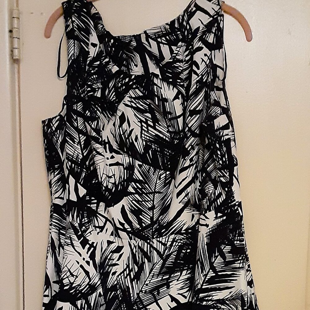Size 16-18 sleeveless dress with a really fun print.